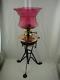 Fabulous Arts & Crafts Messenger's Oil Lamp, Wrought Iron Base, Cranberry Shade