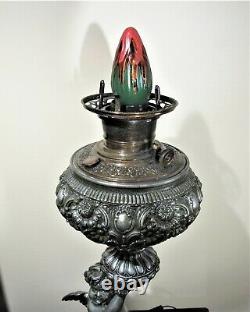 Gorgeous Victorian 1880's Winged Cherub Oil Lamp with Cranberry Swirl Shade