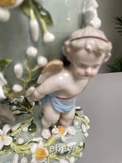 Green Sitzendorf porcelain oil lamp, 19th century. Cherubs putti