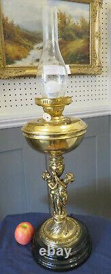 Huge Victorian Cast Brass Oil Lamp Converted To Electricity Held Up By Cherubs