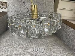 Kinkeldy A German 1960s/70s crystal prism four-tier chandelier light fitting