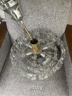 Kinkeldy A German 1960s/70s crystal prism four-tier chandelier light fitting