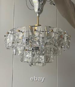 Kinkeldy A German 1960s/70s crystal prism four-tier chandelier light fitting