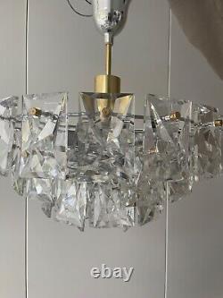 Kinkeldy A German 1960s/70s crystal prism four-tier chandelier light fitting