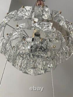 Kinkeldy A German 1960s/70s crystal prism four-tier chandelier light fitting