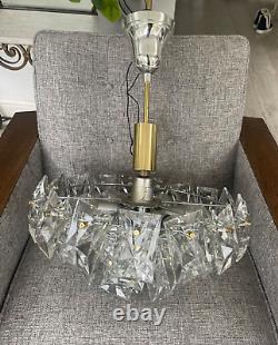 Kinkeldy A German 1960s/70s crystal prism four-tier chandelier light fitting