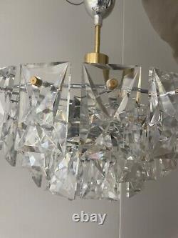 Kinkeldy A German 1960s/70s crystal prism four-tier chandelier light fitting