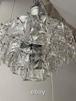 Kinkeldy A German 1960s/70s crystal prism four-tier chandelier light fitting