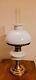 Kosmos Brenner Oil Lamp with milk glass and brass base and Bear Kamenz Crystal