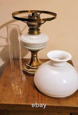 Kosmos Brenner Oil Lamp with milk glass and brass base and Bear Kamenz Crystal