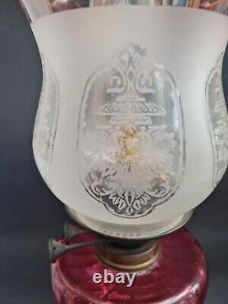 Lovely duplex ruby oil lamp with ruby shade. It Needs TLC