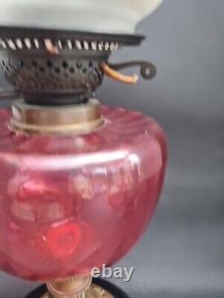 Lovely duplex ruby oil lamp with ruby shade. It Needs TLC