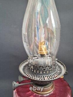 Lovely duplex ruby oil lamp with ruby shade. It Needs TLC