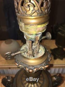 Pair of bronzed antique colza oil lamps with shades moderator
