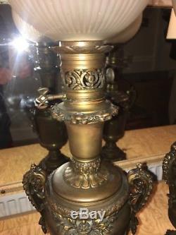 Pair of bronzed antique colza oil lamps with shades moderator