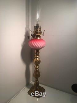 Pink wrythen moulded satin twist peg oil lamp brass base zimmerman & co