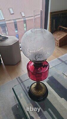 Stunning Victorian Oil Lamp with Cranberry Glass, Brass Column on Wood Base