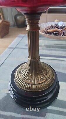 Stunning Victorian Oil Lamp with Cranberry Glass, Brass Column on Wood Base