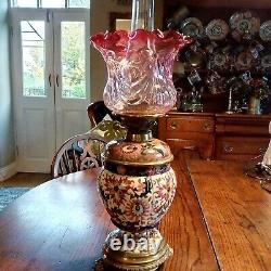 Superb Victorian Oil Lamp Ceramic And Brass With Cranberry Shade Perfect