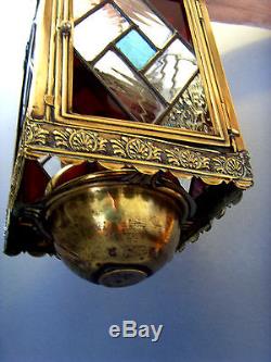 VICTORIAN STAINED GLASS BRASS LANTERN WITH ITS THE WIZARD OIL LAMP, c1880