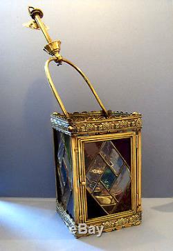 VICTORIAN STAINED GLASS BRASS LANTERN WITH ITS THE WIZARD OIL LAMP, c1880