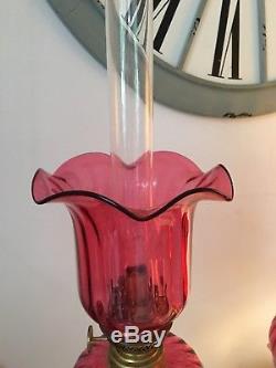 Victorian antique double cranberry glass and brass oil lamp