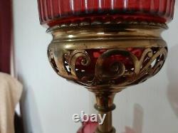Victorian banqueting oil lamp with cranberry shades