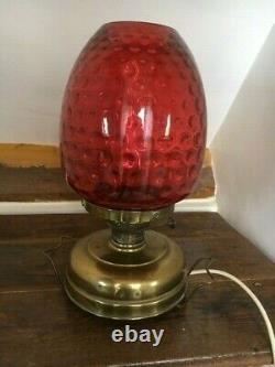 Victorian oil lamp with cranberry glass, converted to electric
