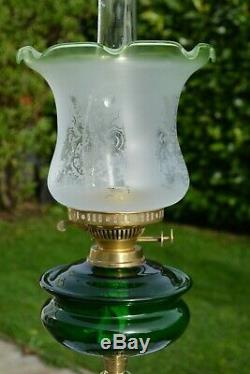 Victorian twin burner oil lamp. Bottle Green font no damage frosted shade etched