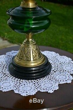 Victorian twin burner oil lamp. Bottle Green font no damage frosted shade etched