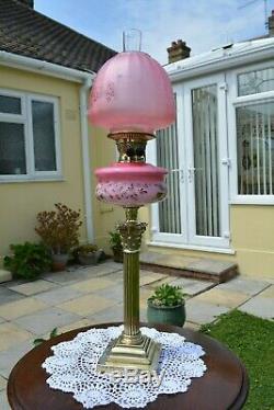 Victorian twin burner oil lamp. Pink floral font later cranberry shade u/k buyer