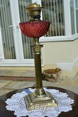 Victorian twin burner oil lamp. Pretty pink cranberry font no damage