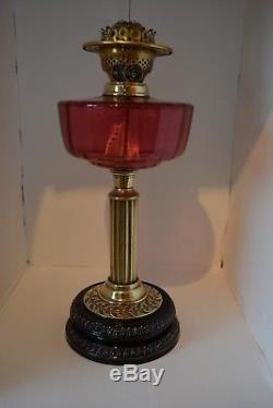 Victorian twin burner oil lamp. Stunning looking cranberry font
