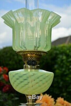 Victorian twin burner oil lamp. Vaseline font and shade all original