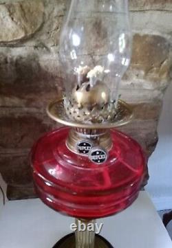 Vintage Oil Lamp Cranberry Glass bowl. 66cm tall