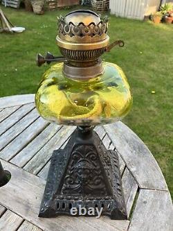 Vintage Oil Lamp With Cast Iron Ornamental Base And Green/Clear Mouth blownFont